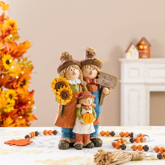 Glitzhome® 10.5" Fall Resin Scarecrow Family Table Decor